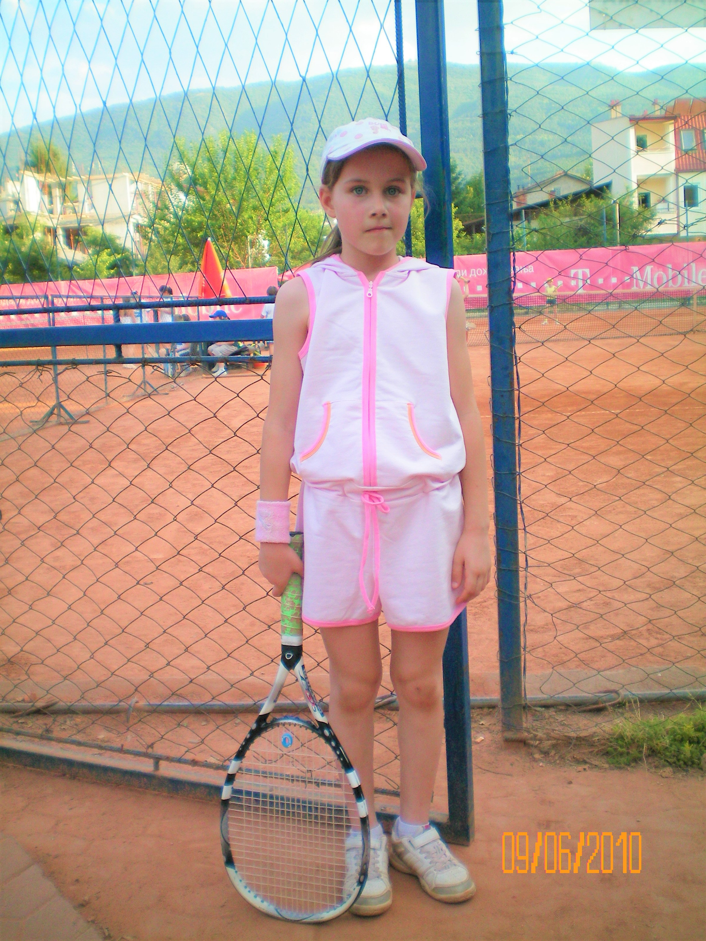 young Kristina tennis photo